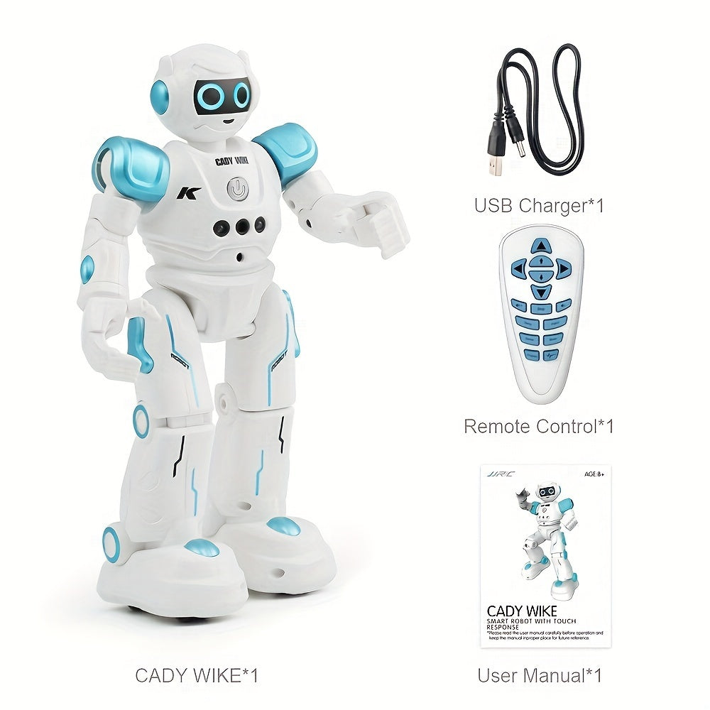 White and blue robot with USB charger, remote control, and user manual on a white background